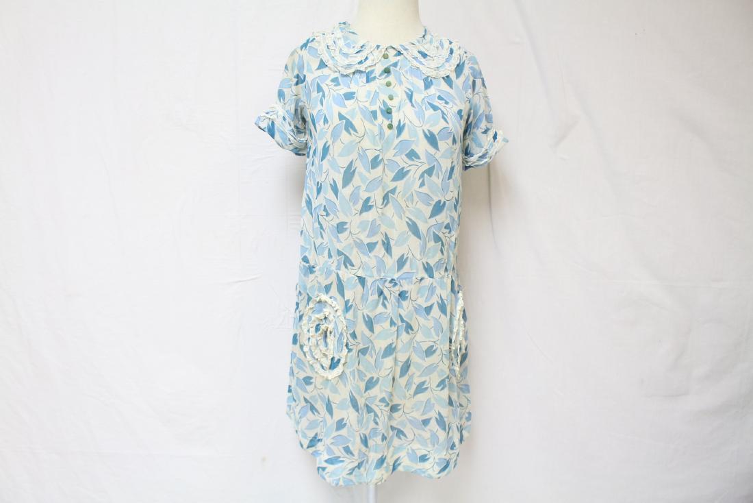 Vintage 1920's Leaf Print Dress: light weight cotton dropped waist dress with lace trim, has repairs and discoloration see photos, approx. chest 34"