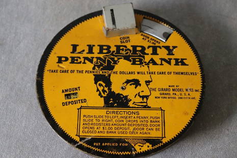 Vintage Liberty Penny Tin Bank: made by The Girard Model Works, Inc. , in good condition