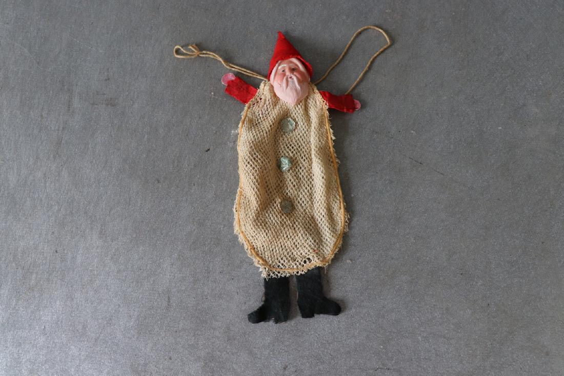Antique Santa Candy Bag: net bag with cloth boots arms & hat, painted celluloid face, in good condition