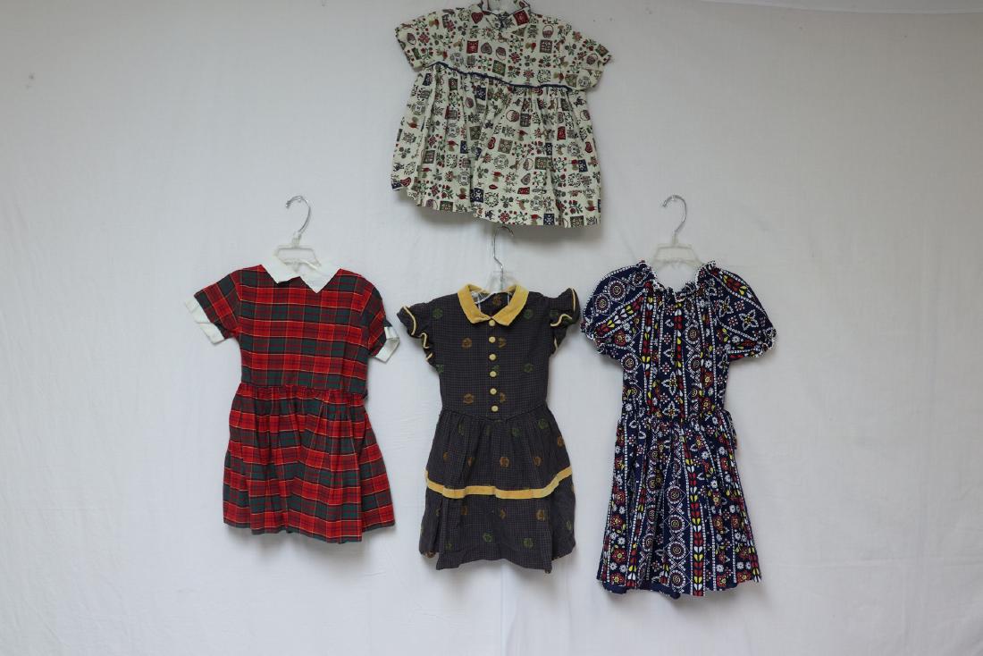 Vintage 1950's/60's Lot of 4 Girl's Dresses: It must be love red plaid dress some yellowing on collar, country print dress in great condition, blue print dress like new condition, Lil Bee velvet trimmed dress in great condition