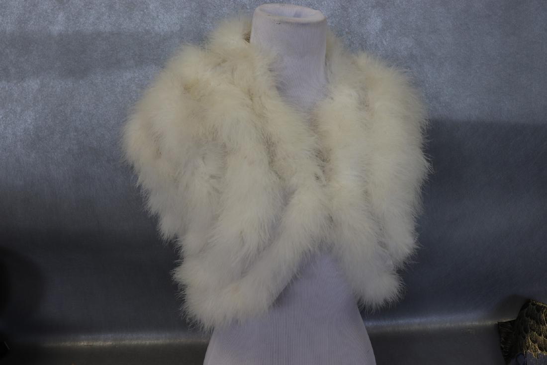 Vintage White Feather Shrug, Shred: White feathers, Acetate lined. One hook & bar at bustline. Measures about 36" at bust (has a bit of a stretch), 18" long. In good condition.