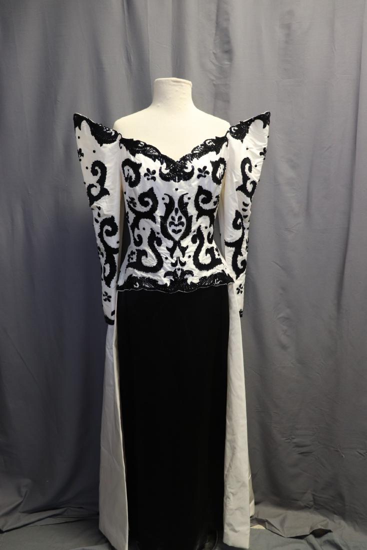 G.Kazazian Beaded Ball Gown, Paris: Labeled Made In Paris, France. Over the shoulder design, full sleeves. Sequins and glass beading on bodice and sleeves, Tulle netting in skirt for fullness. Fully lined with 18" zipper in back (needs 