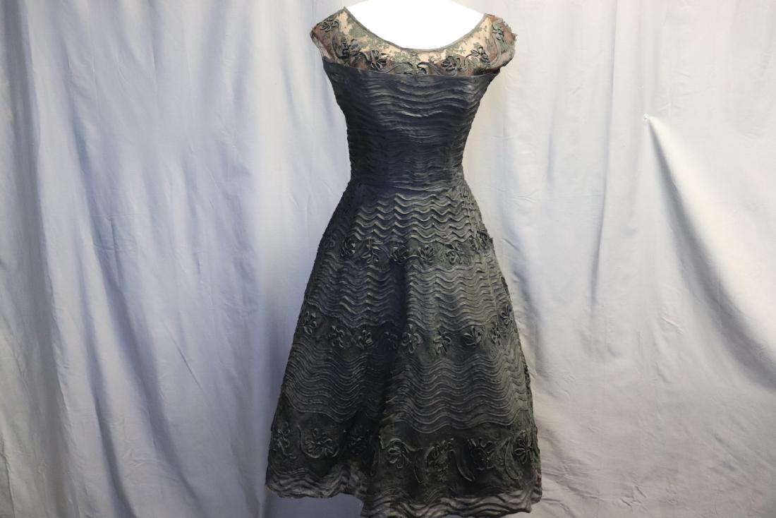 1950's Holt Renfrew Lace & Ribbon Princess Dress: fit and flare, shear netted yoke with lace and ribbon detail, fitted bodice with boning, full skirt with under skirt and lace and ribbon throughout, has some damages most can be repaired and made unno