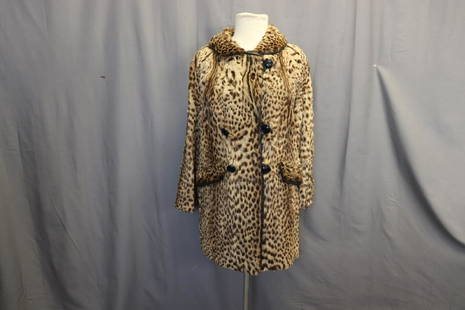 Vintage Double Breast Ladies Cheetah Fur Coat: Nice Coat Fur in Great Condition, double breasted and front pockets, trimmed with leather cord, approx. 40 bust, 36 waist