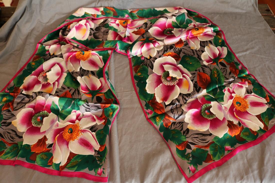 Vintage Silk Oscar De La Renta Multicolor Floral Print: Vintage silk scarf marked Oscar De La Renta features bright, bold flower and leaf print with greens, magenta, and golden browns. Some raw edges coming unrolled, see photos. Measures approx. 15 inches