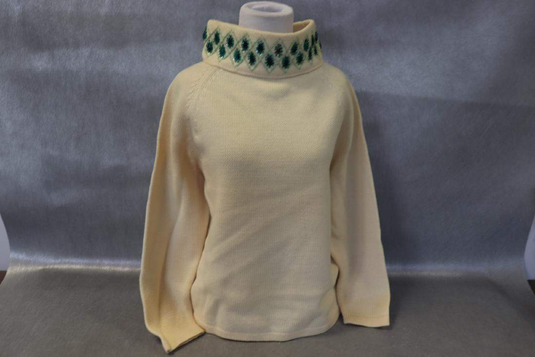 Ladies Vintage Wool & Beaded Sweater: Saks fifth avenue made in British colony Hong Kong, 100% wool long sleeve large turtle neck trimmed with emerald green beads and sequin, one loose beads see photo, size 40