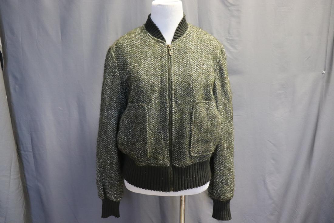 Vintage Isable Marant Wool Ski Sweater: Zip front, 2 pockets, ribbing at wrists, waist, neckline. Made in Poland, wool, alpaca, mohair, polyamide, viscose lined. 38" at chest, 22" long, 16" across shoulders. Great condition.