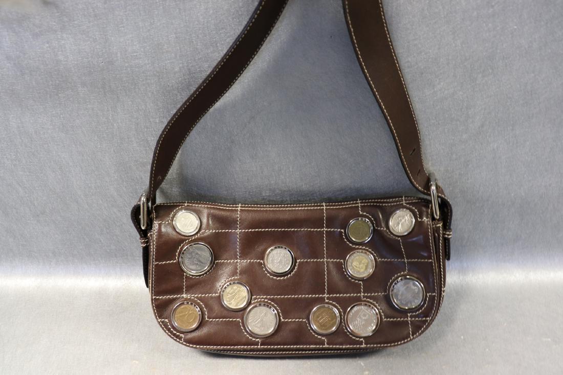 Vintage Celine Leather Pocketbook With Coins: Numbered- 0631, brown leather pocketbook, twill lining, magnetic snap. Features coins from around the world. Measures approx. 6x11". Great condition.