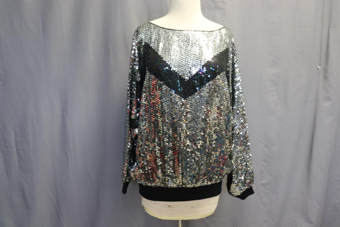 Vintage Silver and Black Sequined Sweater: Silk crepe lined, rib knit at cuffs and waist band. Bust approx. 40, waist 40, length 25". Great condition.