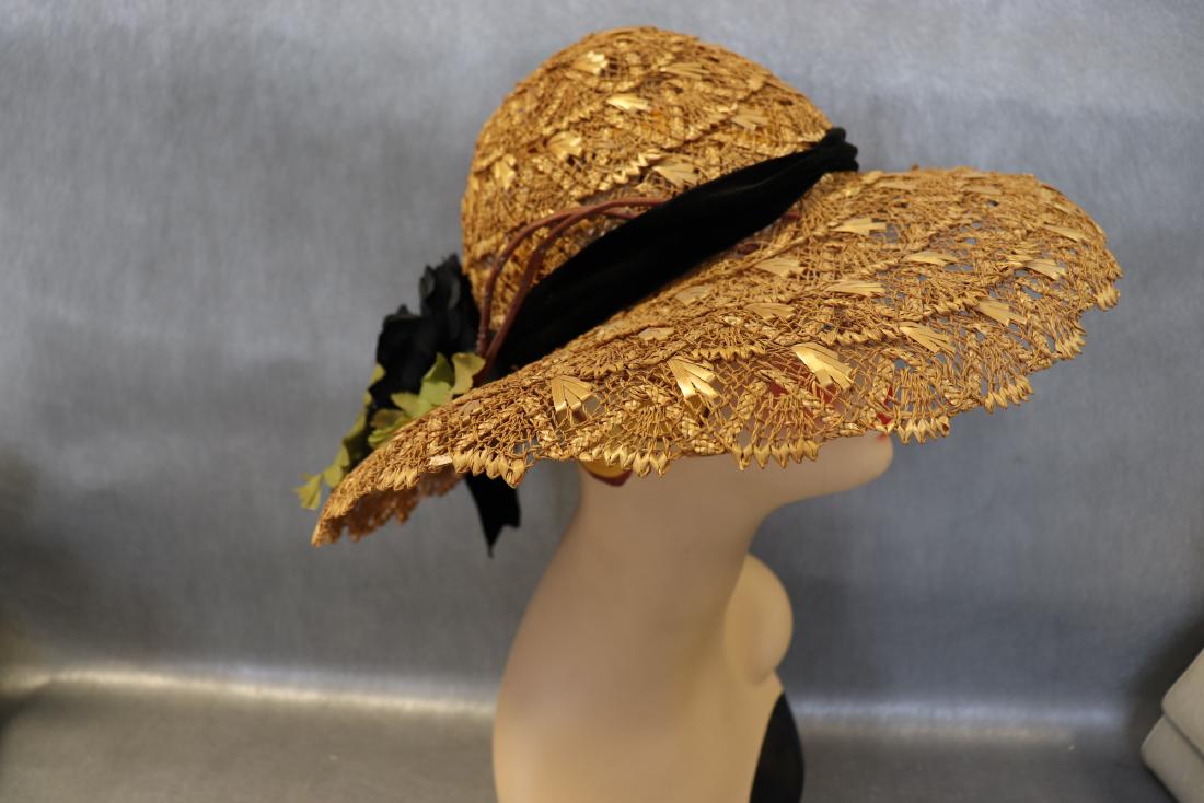 Vintage Woven Straw Wide-Brim Hat, Flowers: Gorgeous wide-brim hat with black and green floral detail, velvet ribbon. Measures approx. 16" across the hat and 22" around inside. Gros grain ribbon trim around the inside. Good condition with a few