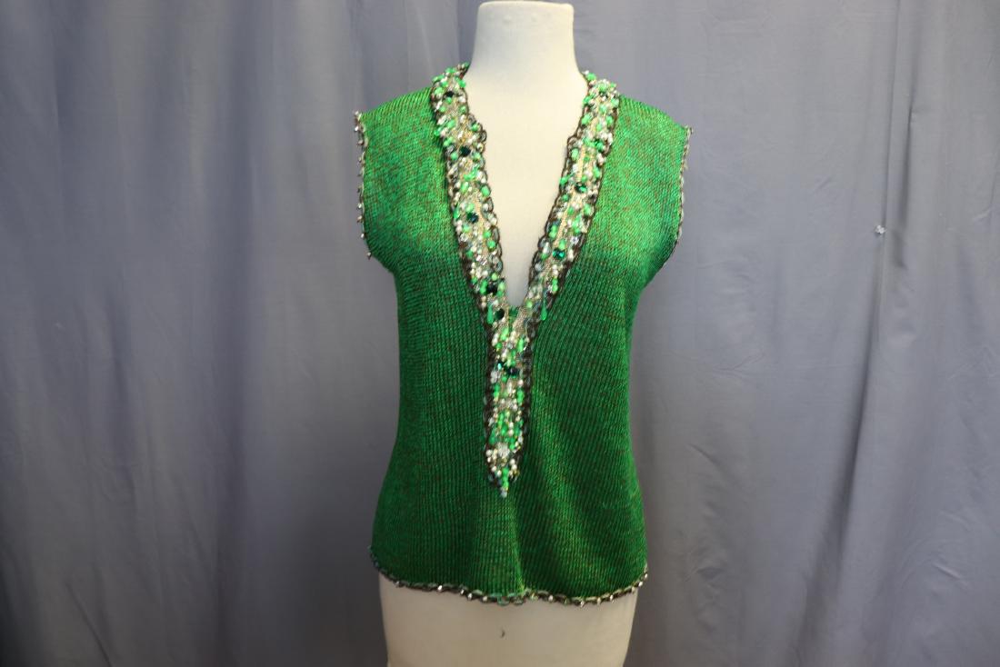 Vintage Green Ramie Knit Sweater Vest, Beads: Ramie knit with metallic thread vest features bead and jewel detail trim. Measures approx. 38 bust, 38 waist, 23" long. Trim needs a few stitches to tac it into place on hem (2" ). Otherwise great con