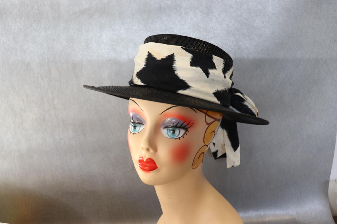 1960 Vintage Sally Victor Raffia Brimmed Hat, Scarf: Sally Victor raffia hat with black and white silk scarf. Very light yellowing on scarf, inside measurement 21". Great condition.