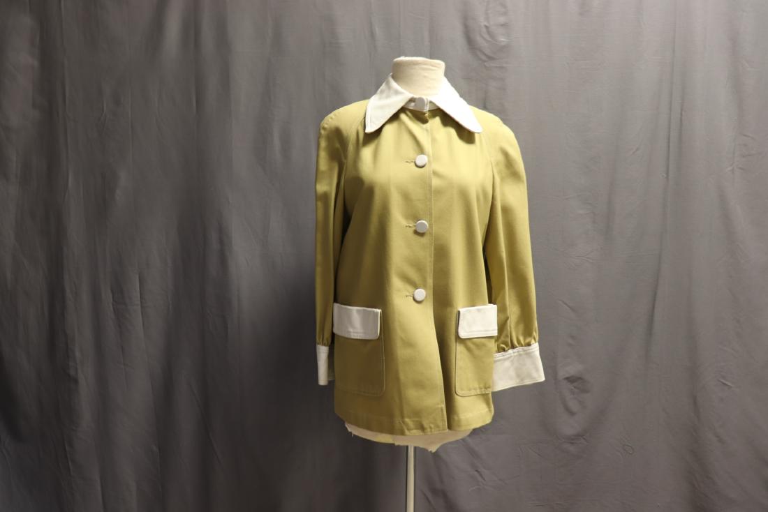 1970's Canvas and Leather Car Coat, Jacket: Khaki canvas-like fabric jacket with white leather trim accents. Approx. size 8- Measures 36" at bust, 40" at waist, 26" long. Great condition, one faint 1/8" spot on front.