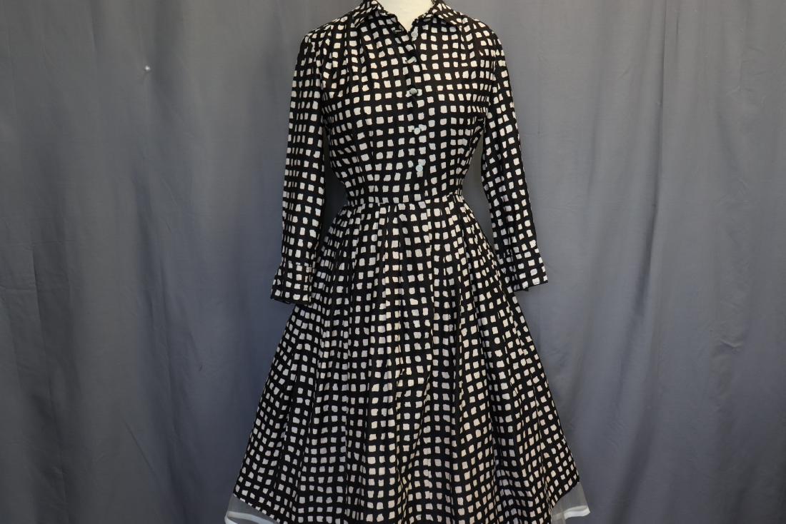 1950's Fritz Mar Shirt Waist Dress: brown with square dots, button front, fit and flare, long sleeve with fold over wing cuffs, full pleated skirt, cotton blend, under arm seam repair needed, some minor discoloration at buttons, nice co