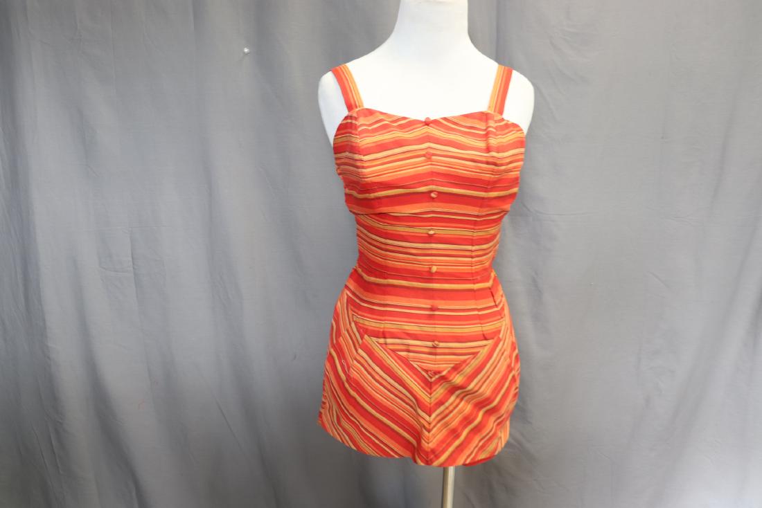 Vintage 1950's Bathing Suit, Jantzen: sweet heart shaped neck line with shoulder straps, decorative button front, bone bra, skirt front over box type short, zips in back with elastic ruching to either side, approx. 32 bust, 24 waist, 35 h