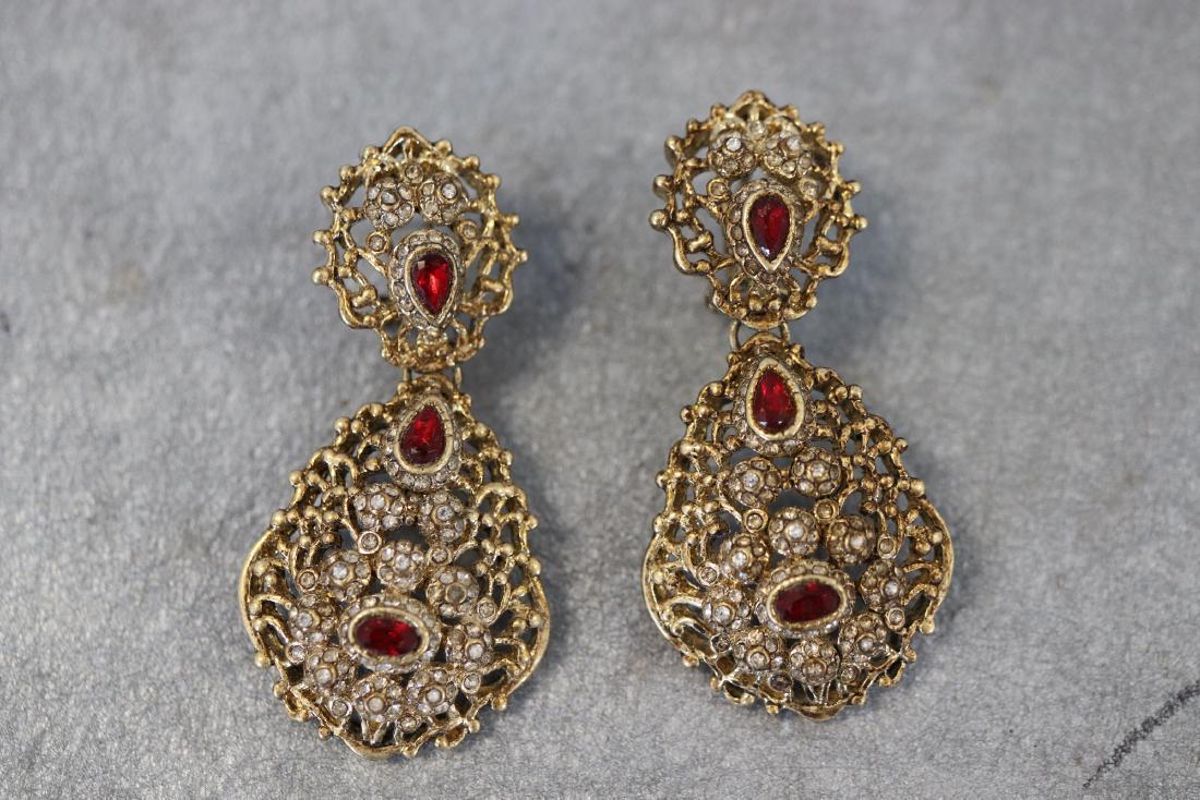 Vintage Gold Tone Asian Earrings With Rhinestones: Rhinestone clusters, red stones, clip on style. Great condition.