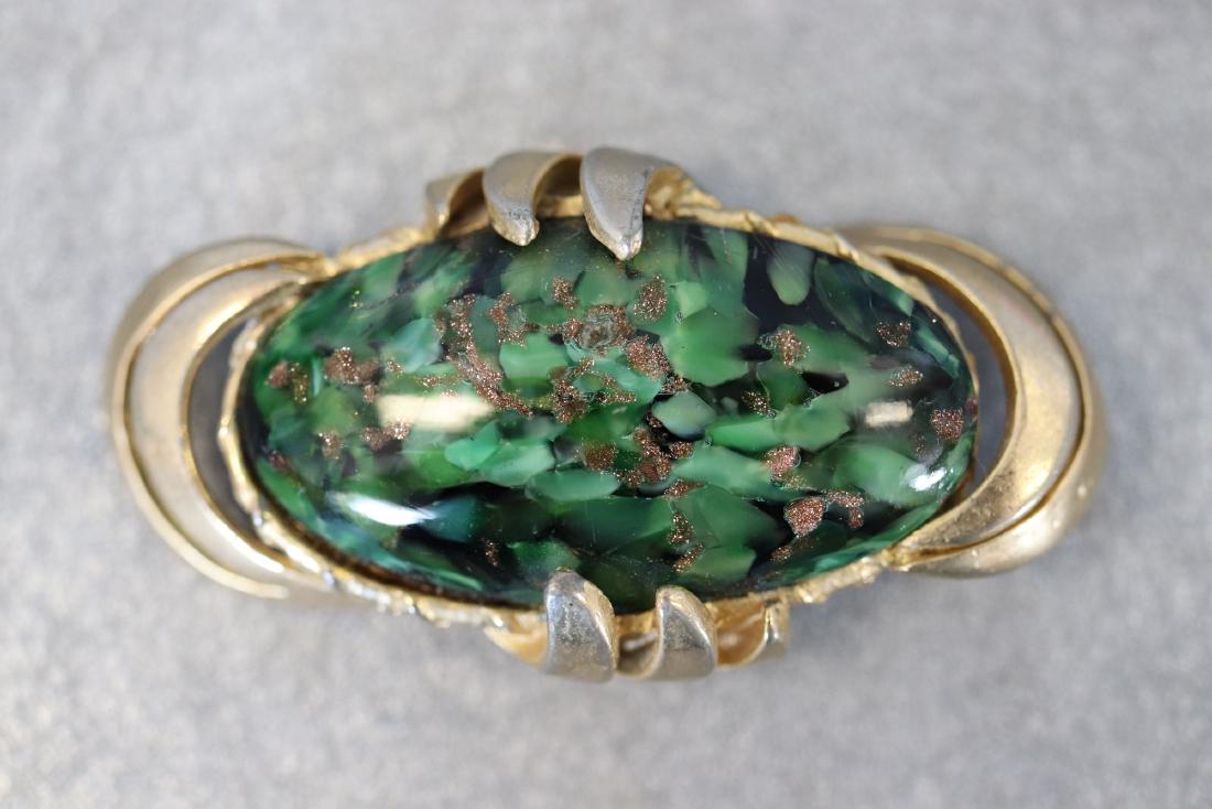 Large Vintage Art Glass Brooch Pin, Signed: Gold tone brooch pin features deep green and metallic fleck art glass. Marked 9483 on back, and what is believed to be SPHINX. In great condition.