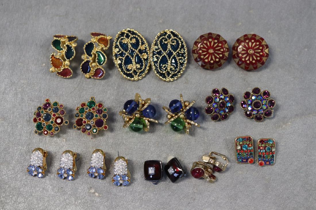 Lot of 11 Vintage Clip-On Earrings: 2 pair Nolan Miller with blue stones, rhinestones. Also includes enameled, cluster colored stones. All in great condition.