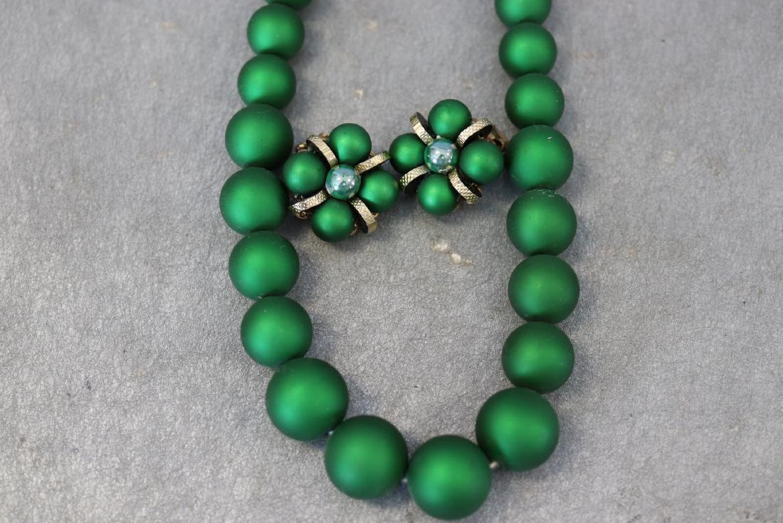 Lot Vintage Green Beaded Necklace, Matching Earrings: Earrings are clip-on. Necklace features graduated sized beads. Clusters of beading on the earrings. All in great condition.