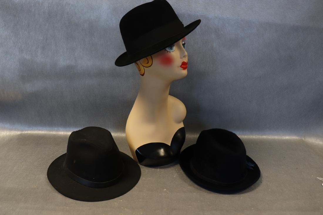 Lot of 3 Stetson Fedora Hats: Navy blue wool felt with blue feathers. Labeled size 7, measures 21" around on the inside, great condition. Black wool felt measures 21" around, great condition. Black canvas-like measures 21 1/2" aro