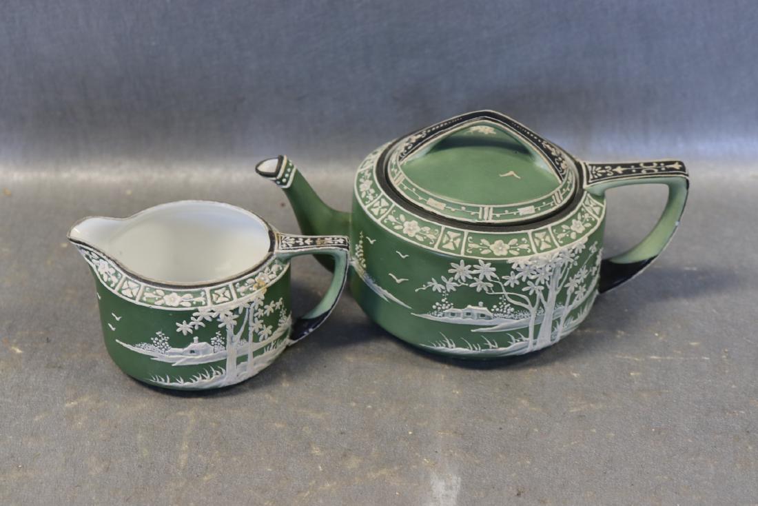 Hand Painted Nippon Coffee Pot & Creamer: green matte finish with white raised design detail scene, nice condition