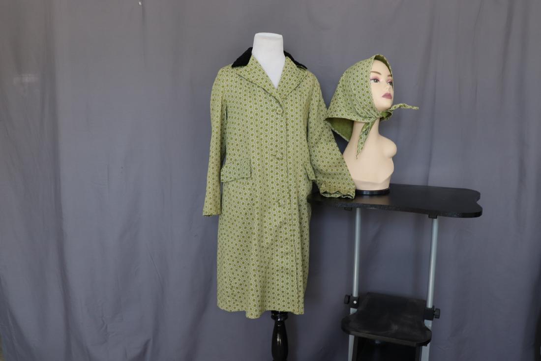 1960's Green Cotton Coat with Matching Head Kerchief: black velvet collar, 3/4 sleeves, light weight coat with lining, lower front flap over pockets, attached belted back with velvet buttons, matching triangle shape kerchief, approx. 36 bust, slight fadi