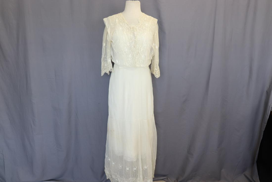 Edwardian Lace & Netted Tea Dress: embroidered lace netting through out, V-Neck, scalloped edges, 3/4 sleeves with scalloped edges, sits at waist, full length skirt with embroidered scalloped hem, see some dark spots and under arm stai