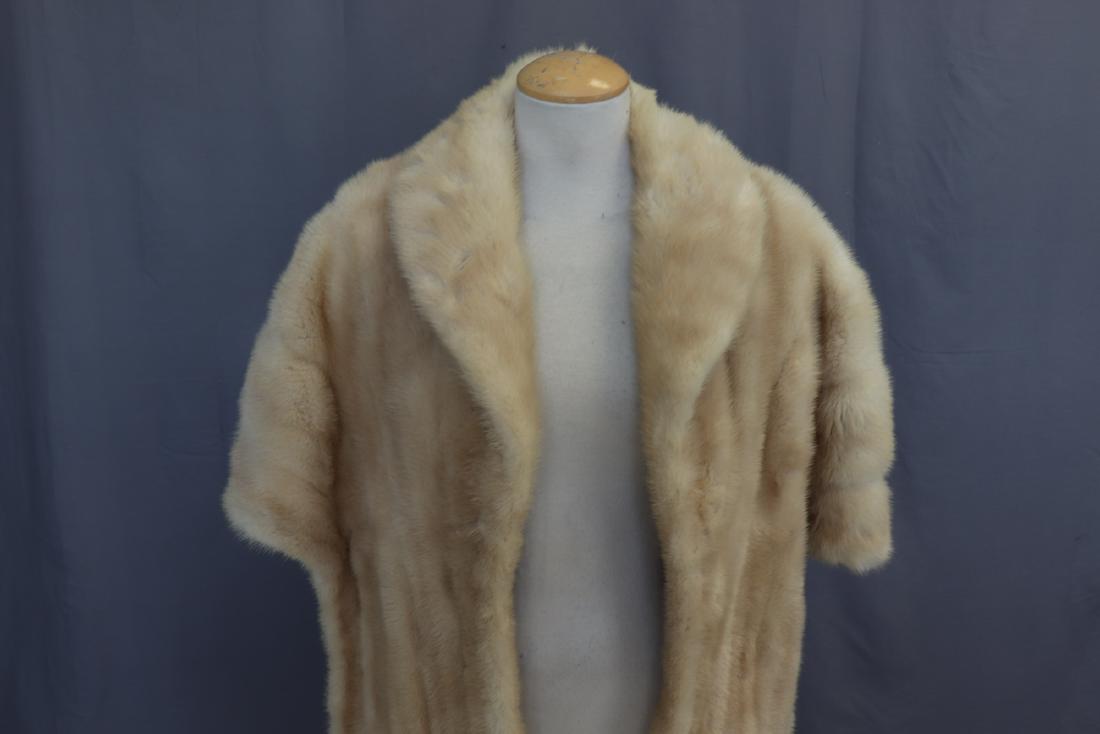 Vintage 1963 Mink Tourmaline Mink Stole: Receipt in pocket from 1963. Two front pockets, fully lined. Measures approx. 36" at bust, approx. 16" across shoulders, 19" long in back, 23" long in front. Needs a few stitches at neck back to hold