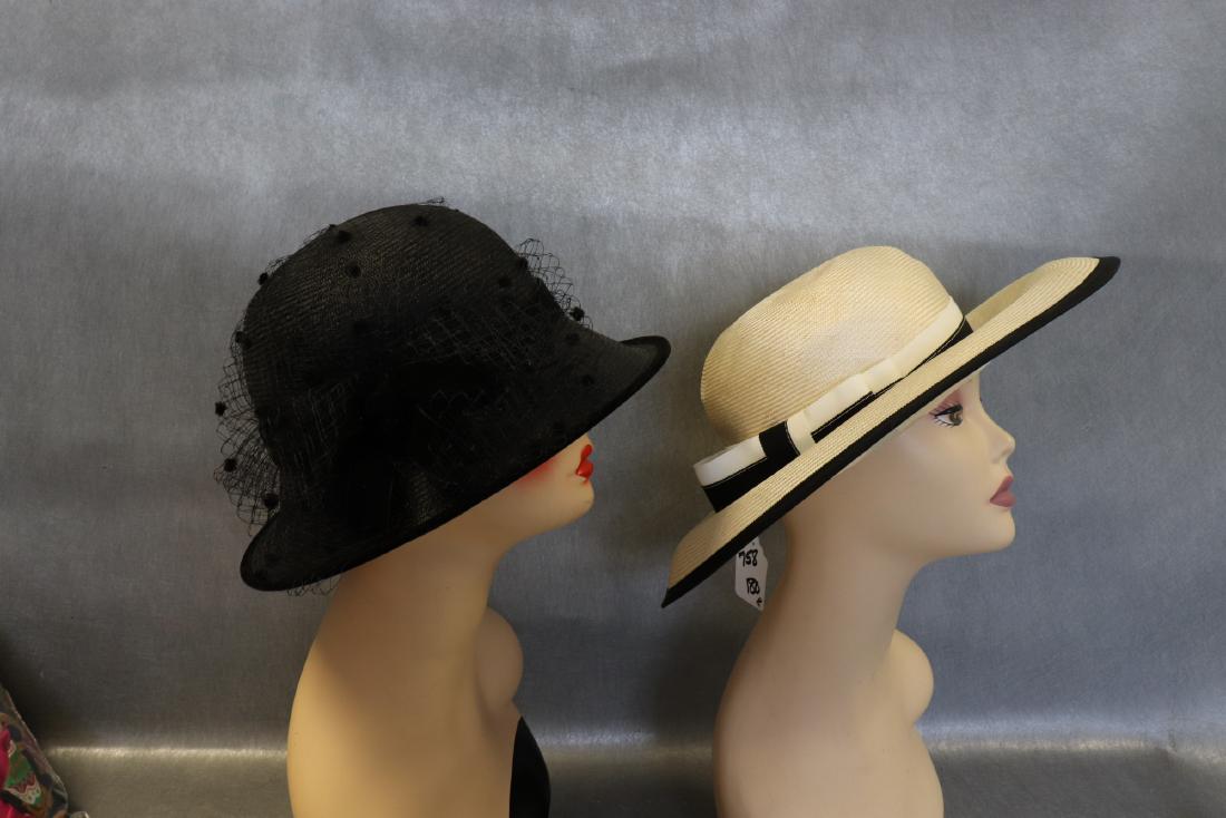 Lot of 2 Vintage Straw Woven Hats: Black Plaza Suite hat with black netting and ribbon, approx. 22" around inside brim. Cream colored Kangol straw hat with black ribbon, old store stock with tags, 22" around inside brim. Both in great 