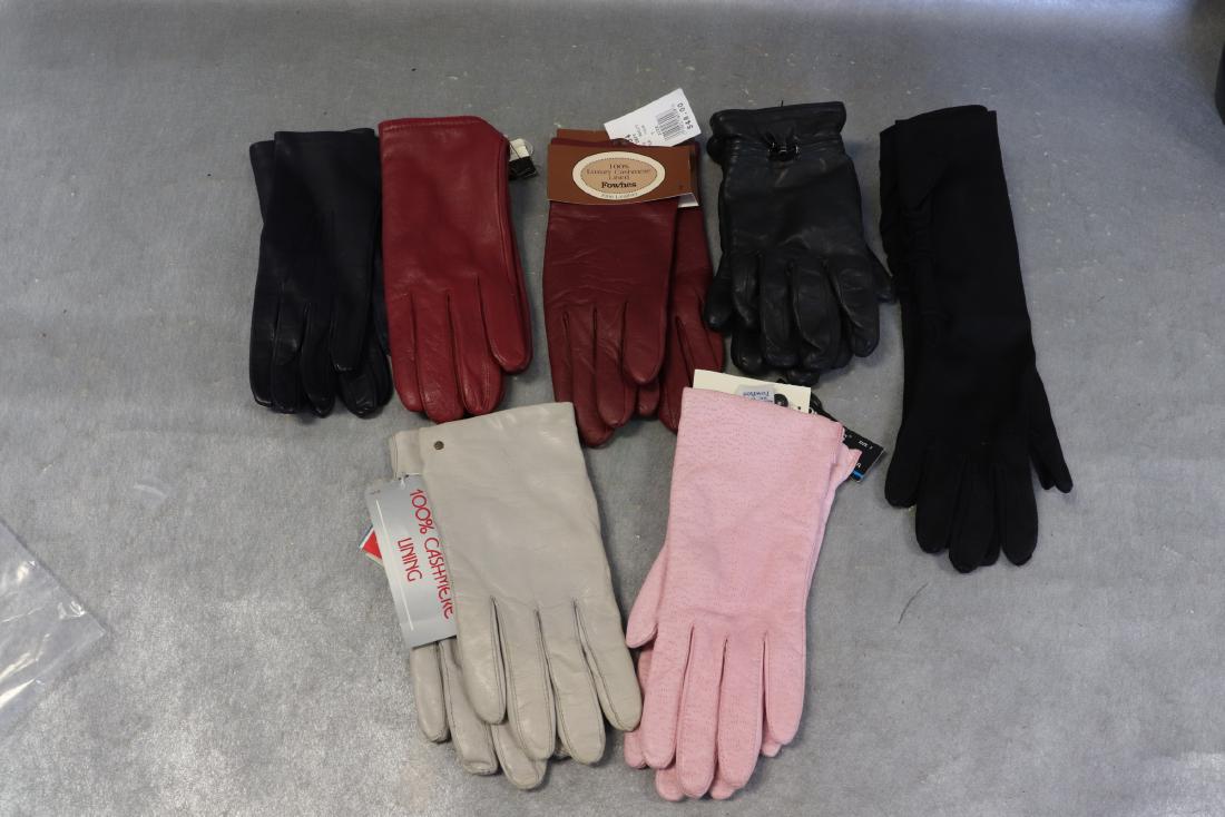 Lot of 7 Pair Vintage Ladies Gloves: 2-pair burgundy red leather gloves with original tags-one lined with cashmere, size 7, 7 1/2. White leather with cashmere lining, size 7 1/2, with original tags. Pink leather, size 7, original tags. B