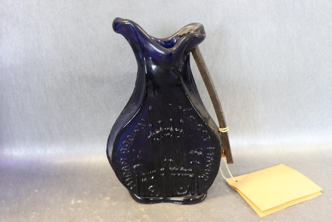 John Harko Hand Blown Studio Glass: very unusual colbalt blue blown art glass pitcher with old mill spike for handle marked amoskeag 1846, bottle isn't that old, Live free or die moto, approx. 8 1/2 inches tall