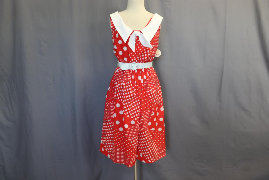 Red and White Polka Dot Sundress: By Nancy of New York, labeled size 11/12, measures approx. 36 at bust, 32 at waist, 42 long. Elastic waist, shirred elastic in back. Good condition, original tags.