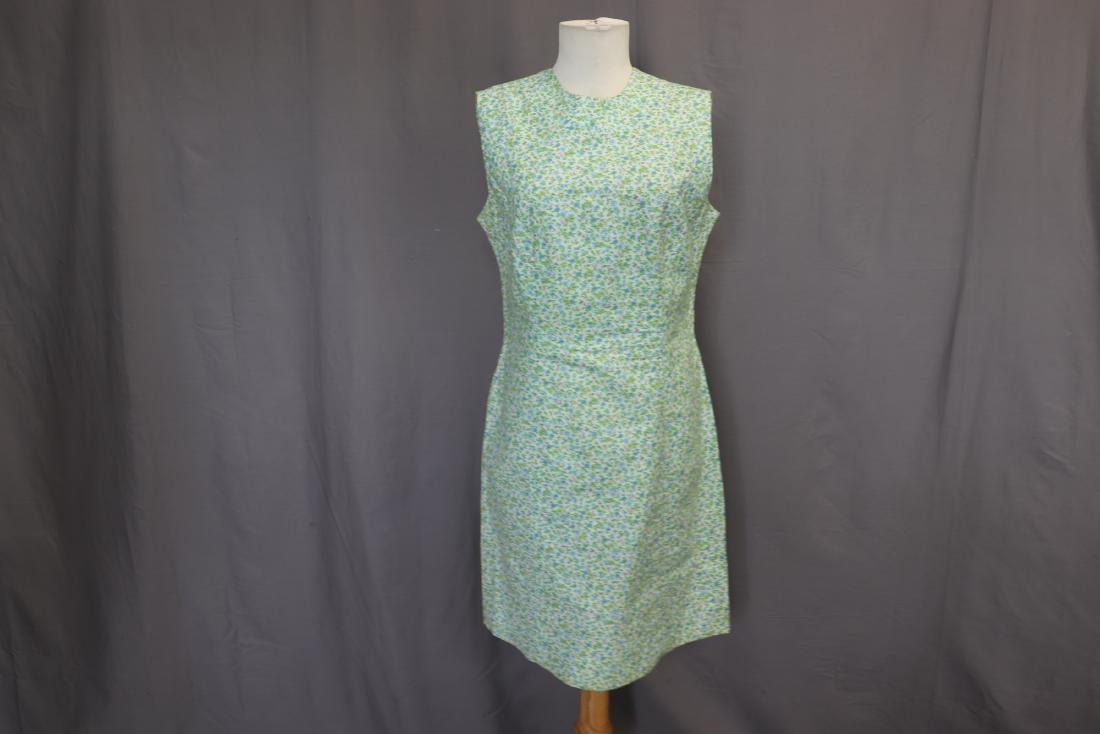 Vintage 1960-70's Cotton Calico Print Dress: Sleeveless style, all cotton, by "Lilly- Judy Bond. Zipper in back, labeled size 14, measures approx. 38 at bust, 37 long. Light fading under arms, light soil on very bottom hem.