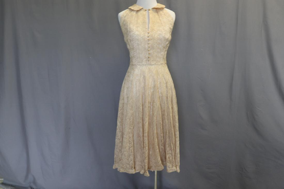 Vintage 1950's Lace Evening Dress: tan lace sleeveless dress, metal zipper back closure, button front, circle skirt, a few small spots & discoloration see photos, approx. bust 32" waist 26"