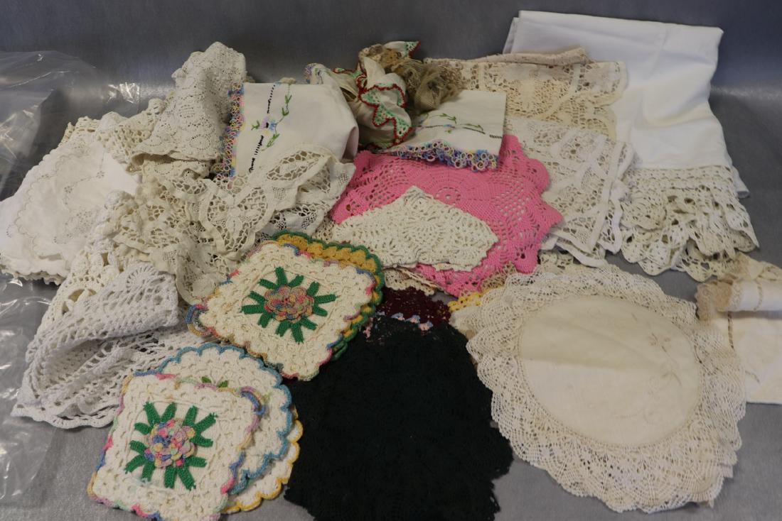 Large Lot Crocheted Runners, Doilies, Potholders: 3 embroidered doilies with tatting (soil), 6 potholders, many doilies and runners, one pillow cover.