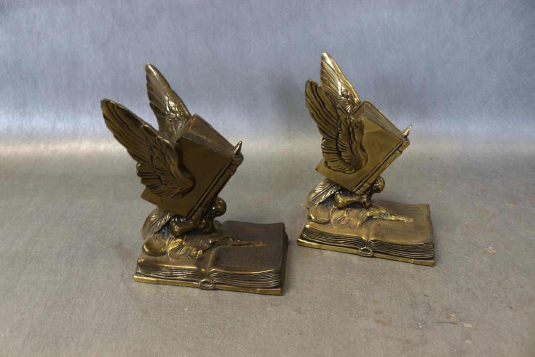 Vintage "Thoughts on Wings" Book Ends: Vintage book ends, made by Jenning Brothers (marked JB 1473), "Thoughts On Wings", brass, each measures approx. 5 1/4 long by 3 1/2 at base and approx. 7 inches high