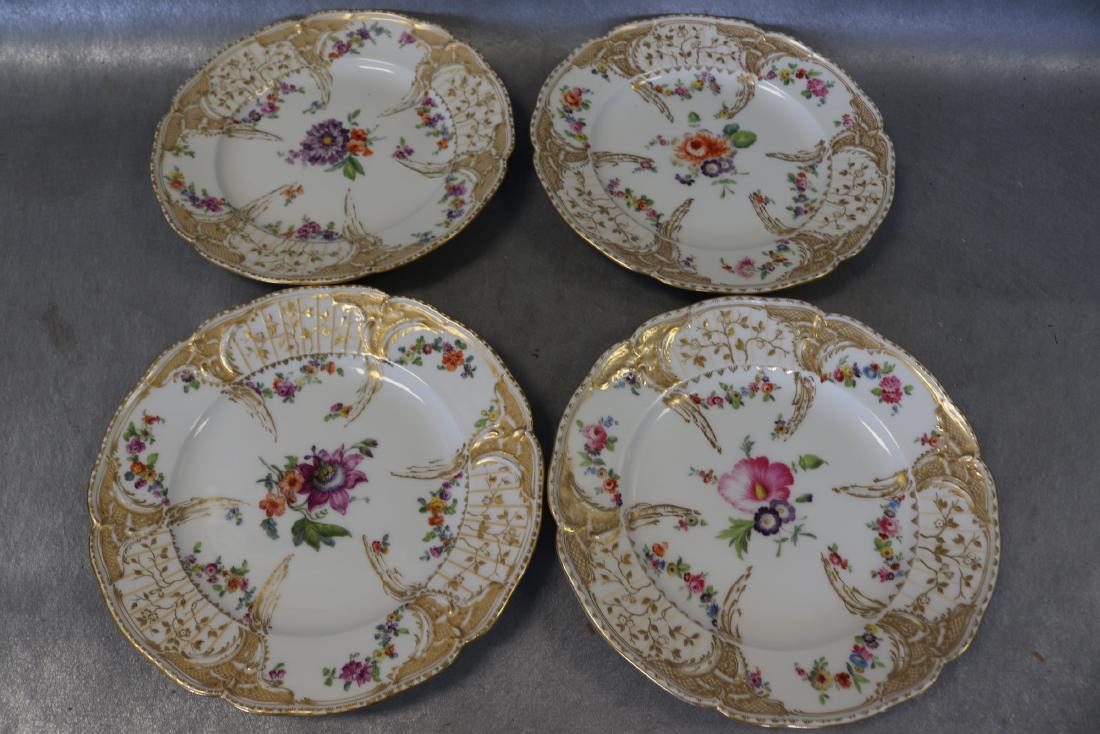 4 KPM Plates, Floral with Gold Leaf: approx. 9 inch plates, good condition, inside (center bottom)rim of 2 of the plates have chips