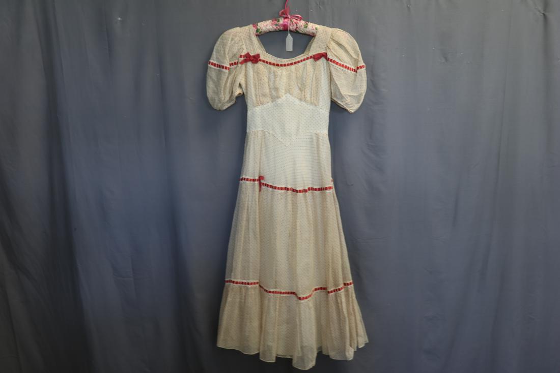 1930's Swiss Dot Fit & Flare: pouf sleeves, square neck, empire waist, flared skirt, ribbon detail, side zipper, ties in back, approx. 32/34 bust, 24 waist, needs cleaning