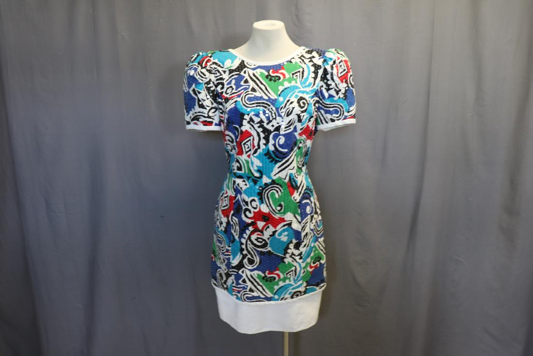 1980's Lillie Rubin Sequin Wiggle Dress: plunging back, round neck, short sleeves, wide white band at hem, great bright print with sequin all over, back zipper, approx. 40 bust, 30 waist
