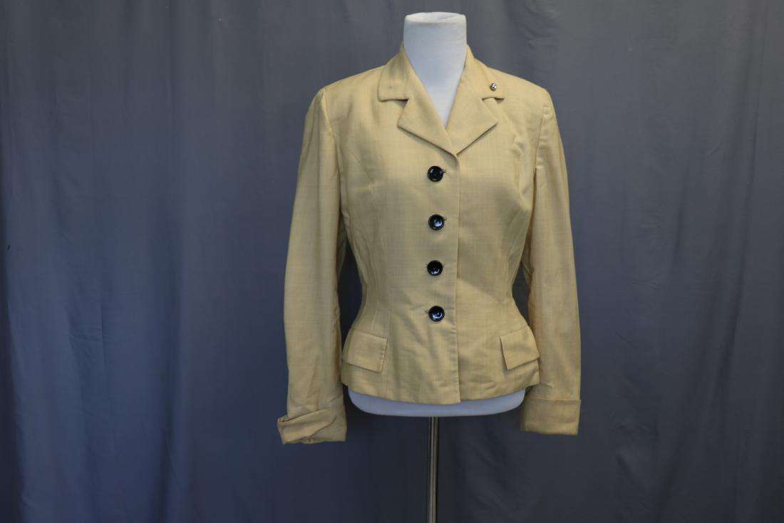 Vintage Pale Yellow Wool Blend Blazer: 2-small front pockets, princess seaming, rhinestone button on lapel (one missing-see photo, small hole left). 38 bust, 34 waist, light mark on left bust, very light soil on cuffs.
