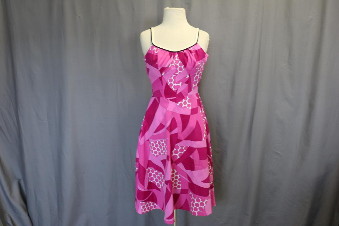 1960's 'De Weese Design' Knit Sundress: Elastic smocking on bodice back, pocket in front, adjustable shoulder straps. approx. 34 bust, 26 waist. Appears to have once had a built in bra. Very light soil around neckline.