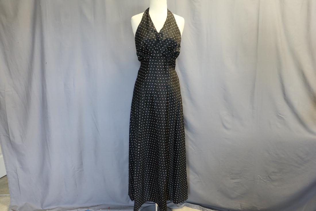 1940's Black w Pink Polka Dot Halter Sundress: Black rayon with tiny pink polka dots, halter style, snaps up the back, self belt, approx. 36 bust, 30 waist, 54 long. A few tiny pin dot holes in skirt-bodice, fabric at center front V is a little th
