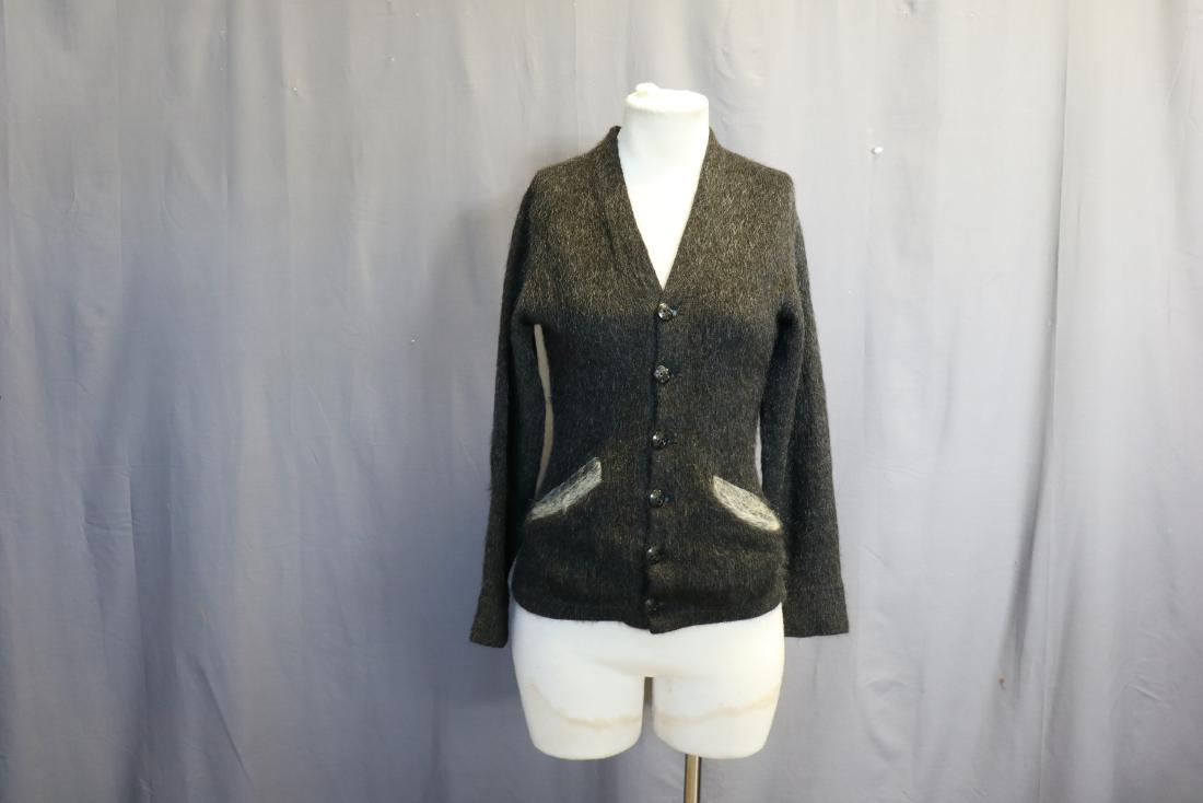 Vintage 1930's Mahair Cardigan Sweater: Decorative buttons in front, interesting seams in back, contrasting fuzzy grey mohair lined pockets, approx. 30 chest, 21 long. Very good condition.