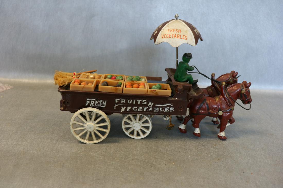 Vintage Cast Iron Toy Food Wagon: Fruits & Vegetables (included) horse drawn wagon, approx. 13" long, 8" tall. Good condition.