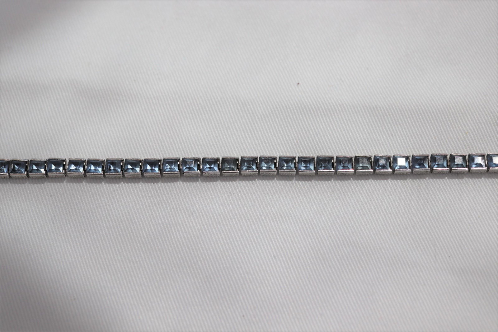 Vintage Sterling w Blue Stones Tennis Bracelet: Approx. 7" long. Marked sterling.
