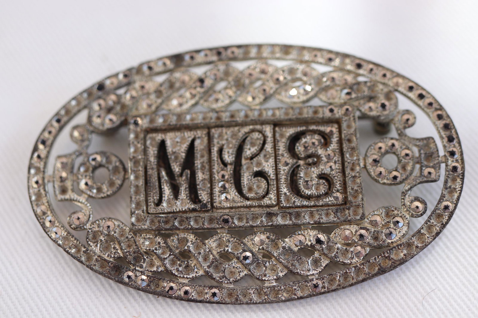 Vintage MCE Marcasite Brooch Pin: Engraved MCE , Missing stones, approx. 2 1/4" across