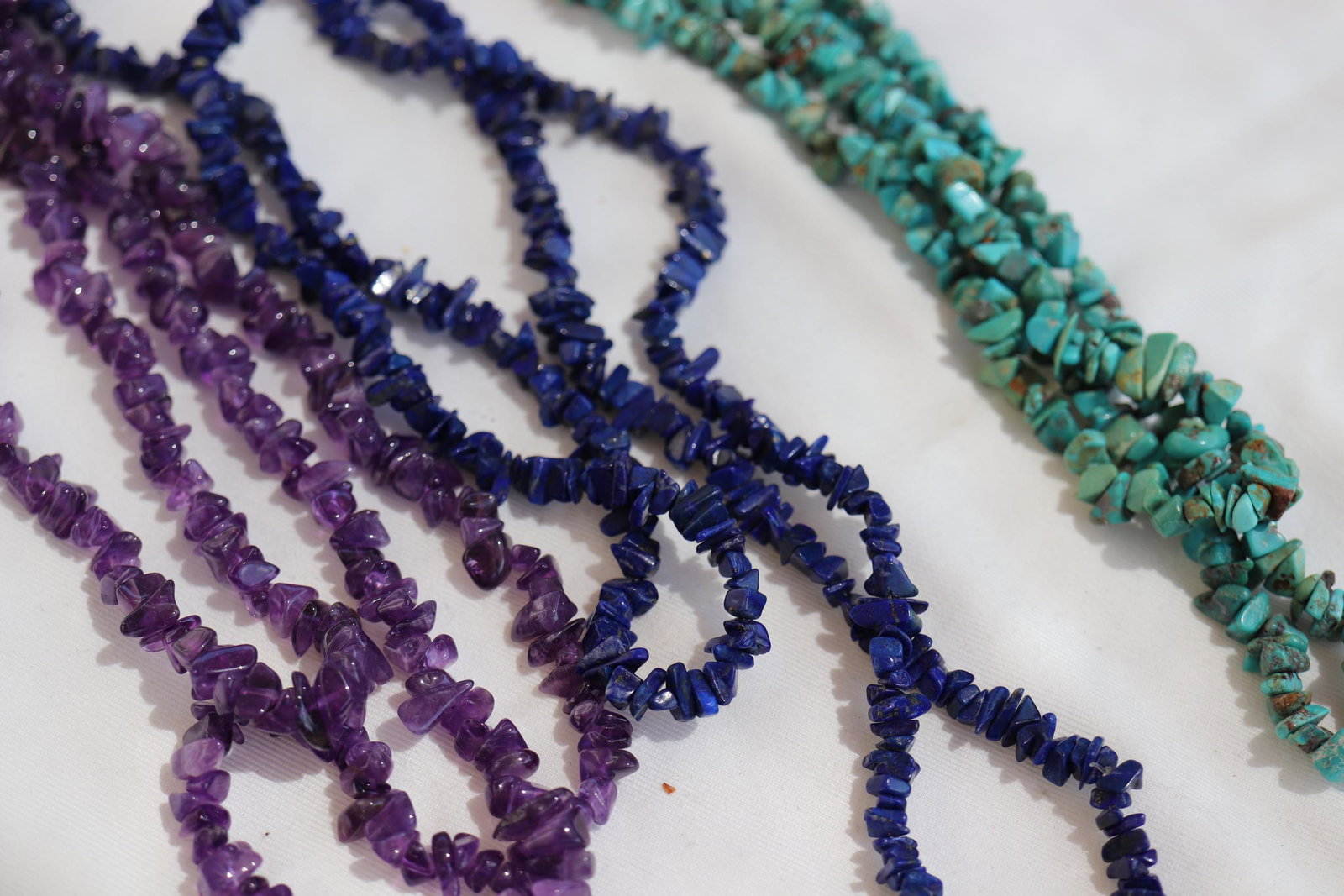 Lot of 3 Vintage Stone Nugget Necklaces: one polished amethyst, turquoise, cobalt blue magnesite, all approx. 34 inches long