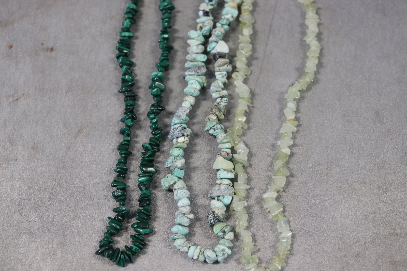 Lot of 3 Green Polished Stone Necklaces: All approx. 34" long.