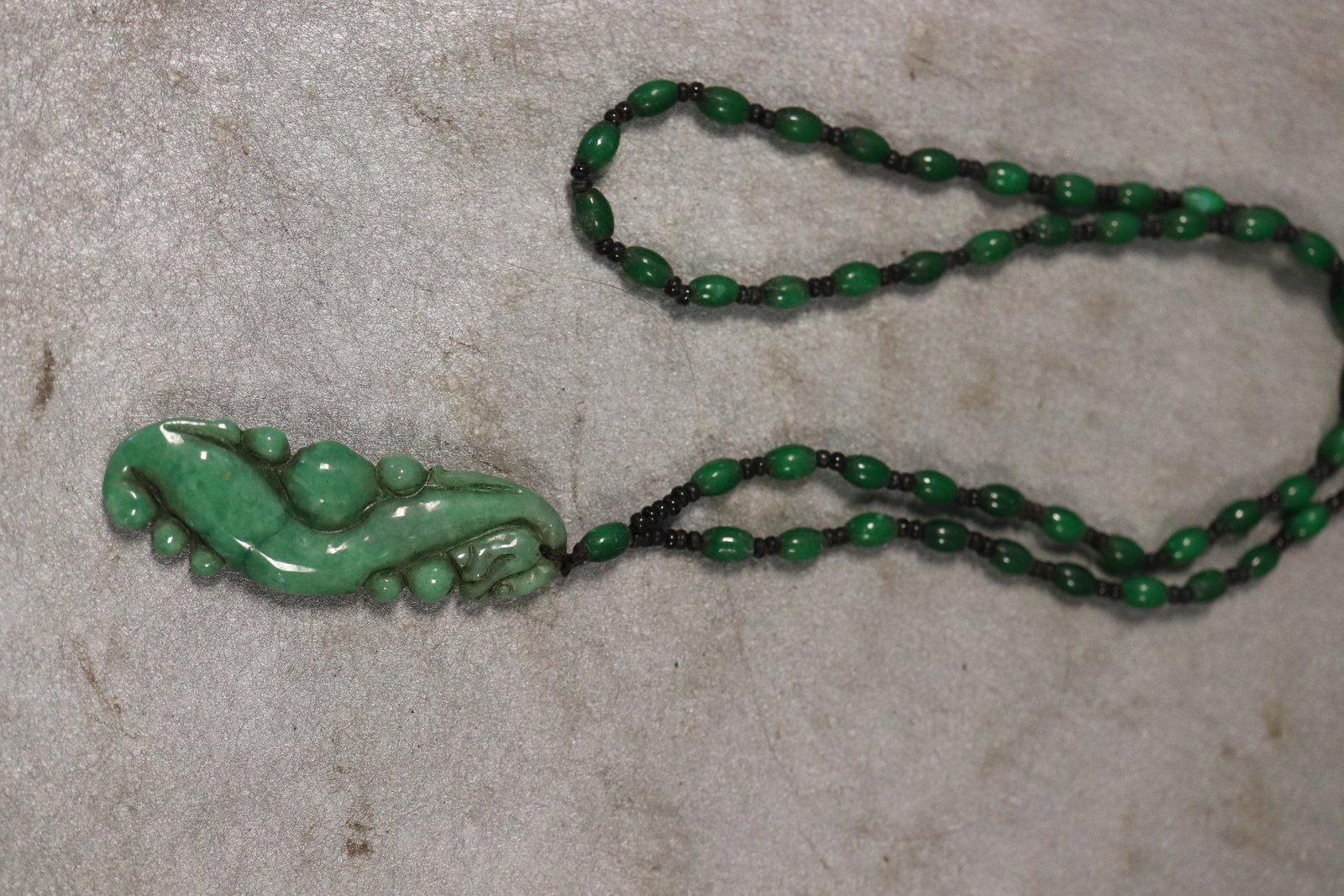 Vintage Hand Carved Green Jade Necklace and Pendant: Pendant approx. 2 1/2" long, necklace approx. 44" long.