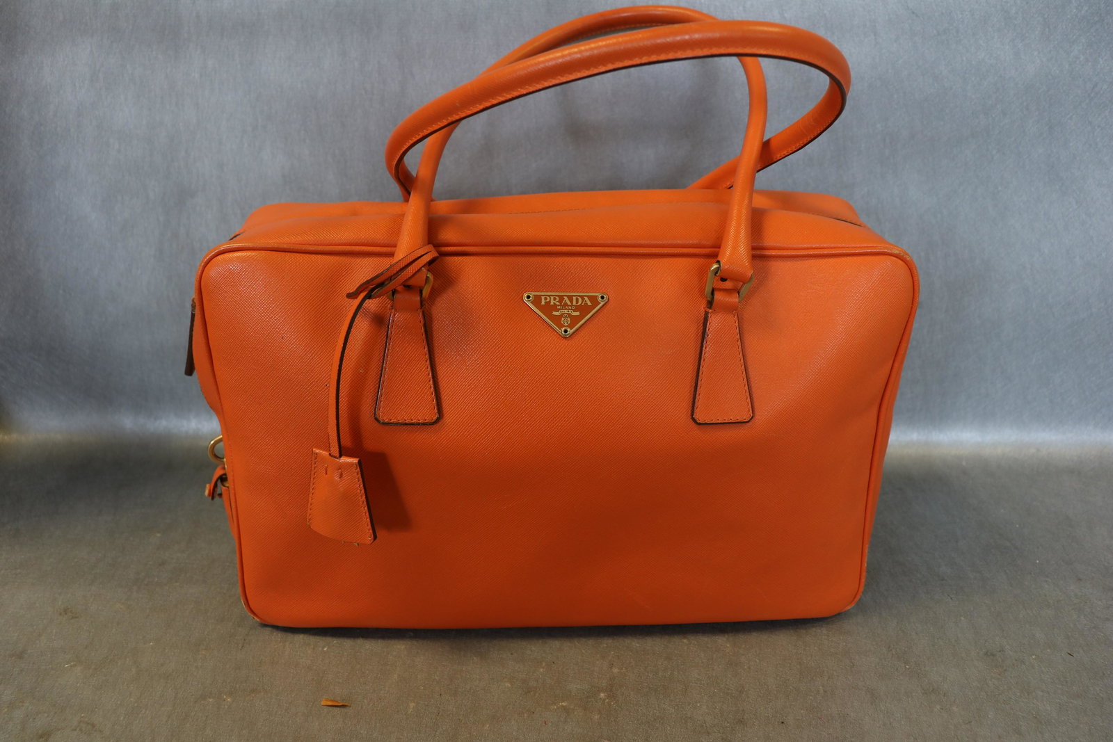 Prada Saffiano Leather Handbag: Made in Italy, fully lined, inside zipper pocket, comes with key & 2 keys, light wear at corners, approx. 14x9"